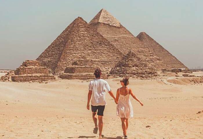 a couple from their visit to the Pyramids of Giza 700x500