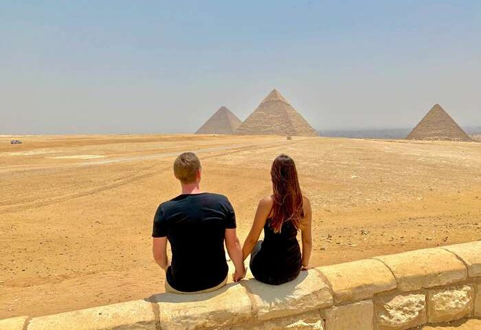 couple with pyramids 700x500